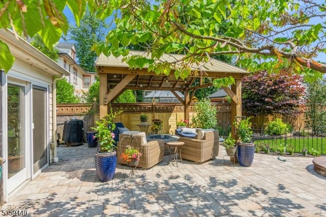 947 Madison Ave, Plainfield City, NJ 07060 - fenced backyard featuring a gazebo, an outdoor living space, and a patio area