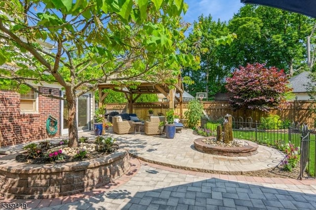 947 Madison Ave, Plainfield City, NJ 07060 - fenced backyard featuring a patio area, outdoor lounge area, and a gazebo