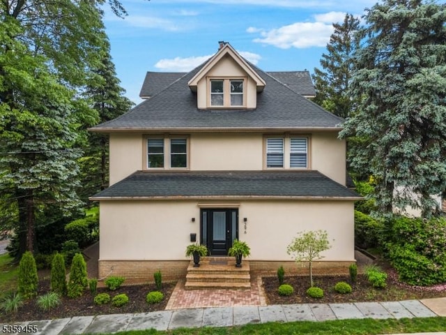 296 Highfield Ln, Nutley Twp, NJ 07110 - view of front facade featuring stucco siding, brick siding, entry steps, and a shingled roof