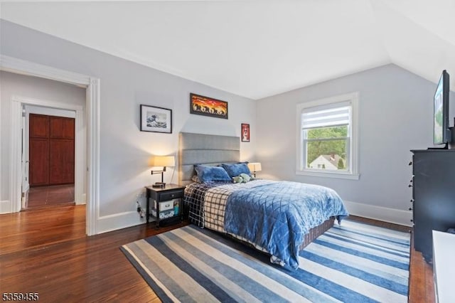 296 Highfield Ln, Nutley Twp, NJ 07110 - bedroom with dark wood-type flooring, baseboards, and vaulted ceiling