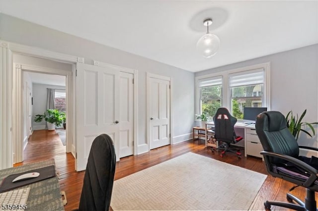 296 Highfield Ln, Nutley Twp, NJ 07110 - home office featuring dark wood-style floors and baseboards