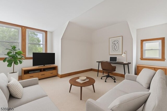 296 Highfield Ln, Nutley Twp, NJ 07110 - living room featuring a desk, light colored carpet, and baseboards