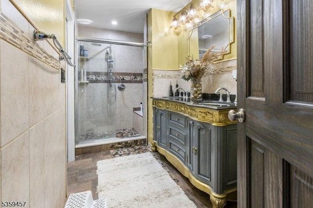 31 Mertz Ave, Belleville Twp, NJ 07109 - full bathroom with a shower stall, vanity, tile walls, and recessed lighting