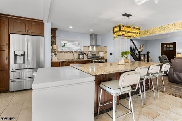 31 Mertz Ave, Belleville Twp, NJ 07109 - kitchen with appliances with stainless steel finishes, wall chimney range hood, a kitchen island, backsplash, and open floor plan