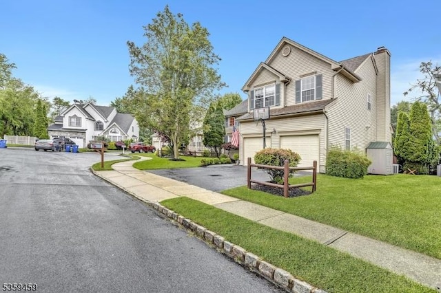 5 Ten Broek Ct, Bridgewater Twp, NJ 08807 - view of front of house featuring an attached garage, driveway, a chimney, and a front lawn
