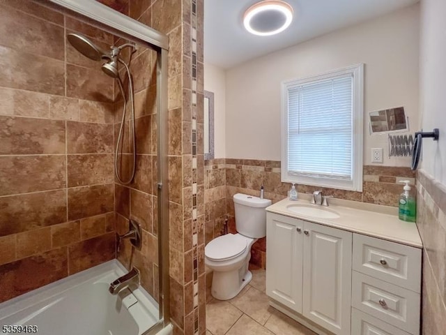 5461 Berkshire Valley Rd, Jefferson Twp, NJ 07438 - bathroom featuring toilet, a shower, tile patterned flooring, vanity, and tile walls