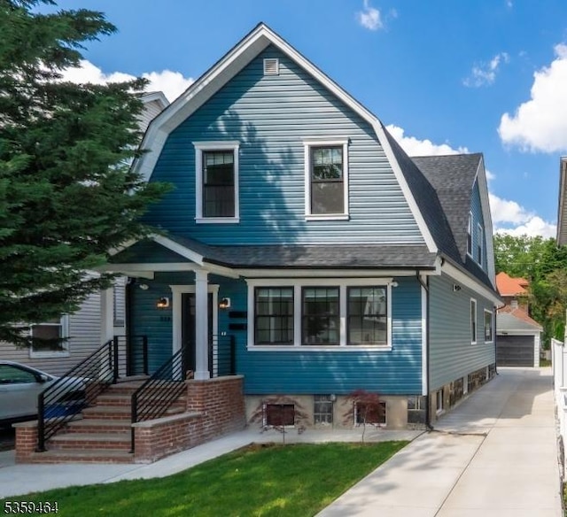 228 78th St, North Bergen Twp, NJ 07047 - dutch colonial with a gambrel roof and roof with shingles