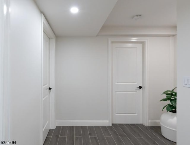 228 78th St, North Bergen Twp, NJ 07047 - hall featuring wood finish floors, baseboards, and recessed lighting