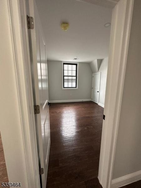 228 78th St, North Bergen Twp, NJ 07047 - additional living space featuring dark wood-style floors and baseboards