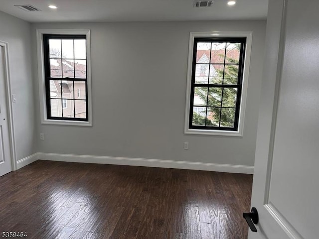 228 78th St, North Bergen Twp, NJ 07047 - unfurnished room with dark wood-style flooring, baseboards, and recessed lighting
