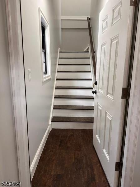 228 78th St, North Bergen Twp, NJ 07047 - stairs with wood finished floors and baseboards