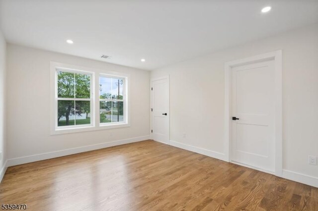 1 Willow Pl, East Hanover Twp, NJ 07936 - empty room featuring wood finished floors, baseboards, and recessed lighting