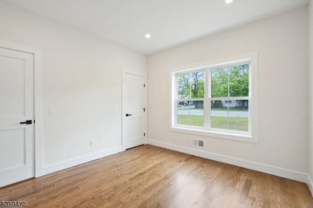 1 Willow Pl, East Hanover Twp, NJ 07936 - unfurnished room featuring baseboards, wood finished floors, and recessed lighting