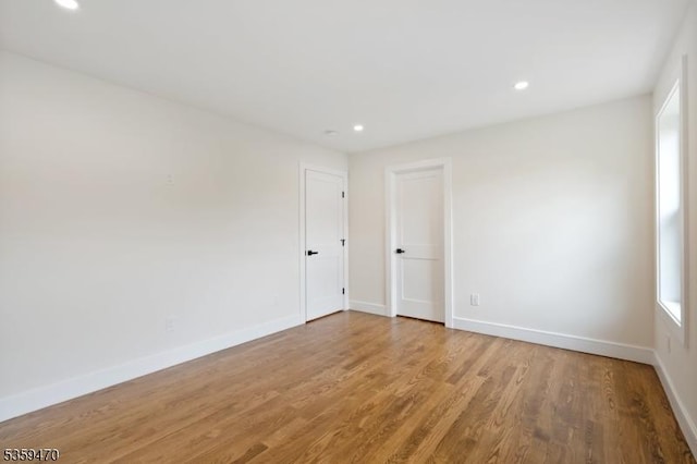 1 Willow Pl, East Hanover Twp, NJ 07936 - spare room featuring baseboards, recessed lighting, and light wood-style flooring
