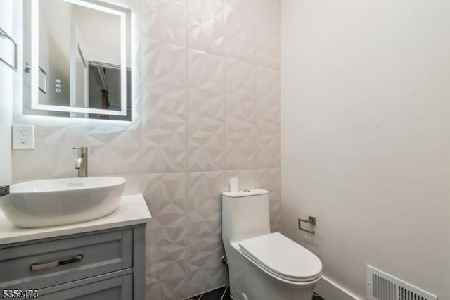 32 N Ave, Fanwood Boro, NJ 07023 - bathroom with tile walls, vanity, and toilet