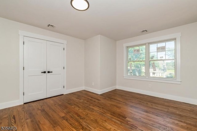 32 N Ave, Fanwood Boro, NJ 07023 - unfurnished bedroom featuring baseboards, wood finished floors, and a closet