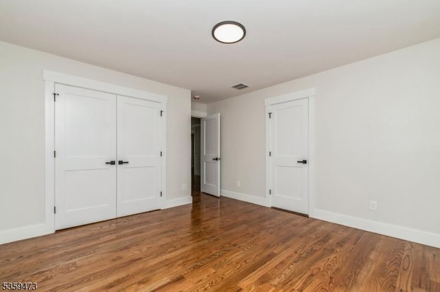 32 N Ave, Fanwood Boro, NJ 07023 - unfurnished bedroom with baseboards and wood finished floors