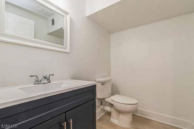 32 N Ave, Fanwood Boro, NJ 07023 - bathroom with toilet, baseboards, wood finished floors, and vanity