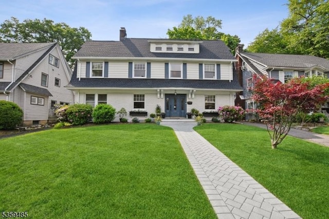 310 Park St, Montclair Twp, NJ 07043 - view of front of house featuring a front yard, a chimney, a shingled roof, and french doors