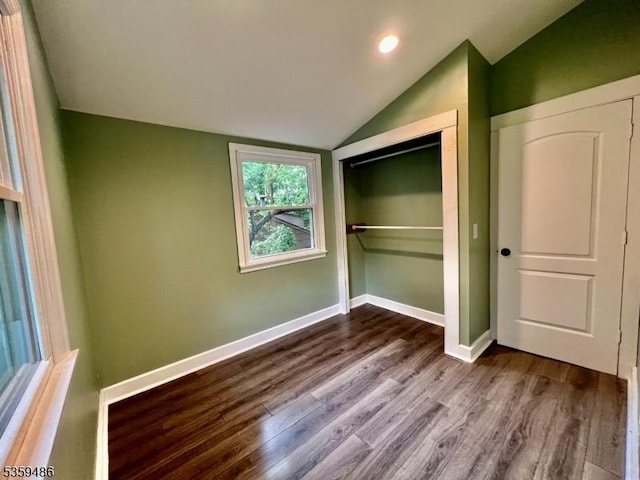 90 Georgia Ave, Jefferson Twp, NJ 07849 - unfurnished bedroom featuring vaulted ceiling, dark wood-style floors, a closet, baseboards, and recessed lighting