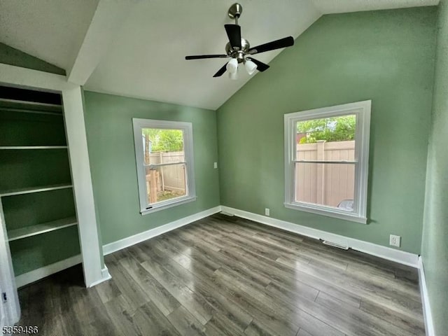 90 Georgia Ave, Jefferson Twp, NJ 07849 - unfurnished room with lofted ceiling, ceiling fan, plenty of natural light, dark wood finished floors, and baseboards