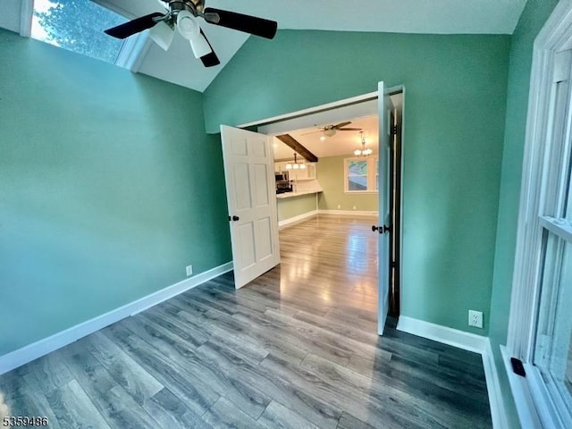 90 Georgia Ave, Jefferson Twp, NJ 07849 - unfurnished bedroom with wood finished floors, baseboards, high vaulted ceiling, and a ceiling fan