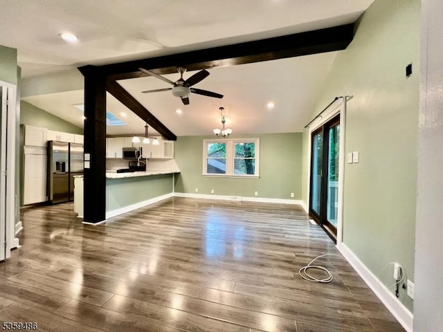90 Georgia Ave, Jefferson Twp, NJ 07849 - unfurnished living room with dark wood-type flooring, a ceiling fan, baseboards, a chandelier, and recessed lighting