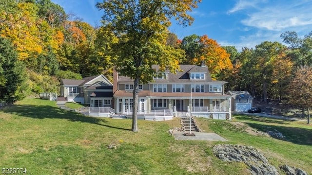 1 Brook Valley Ter, Kinnelon Boro, NJ 07405 - view of front of house featuring a front yard, stairway, a wooden deck, and a porch
