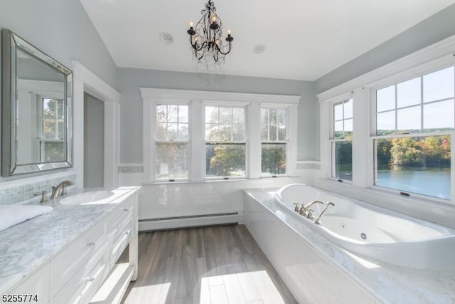 1 Brook Valley Ter, Kinnelon Boro, NJ 07405 - full bath featuring baseboard heating, vanity, a whirlpool tub, a chandelier, and a wainscoted wall