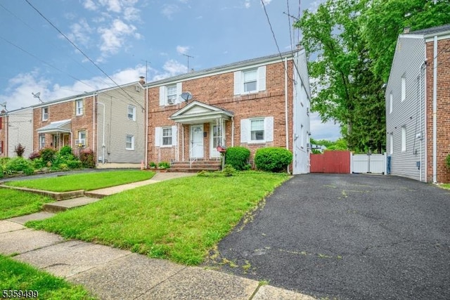 777 W Scott Ave, Rahway City, NJ 07065 - multi unit property featuring brick siding, driveway, and a gate