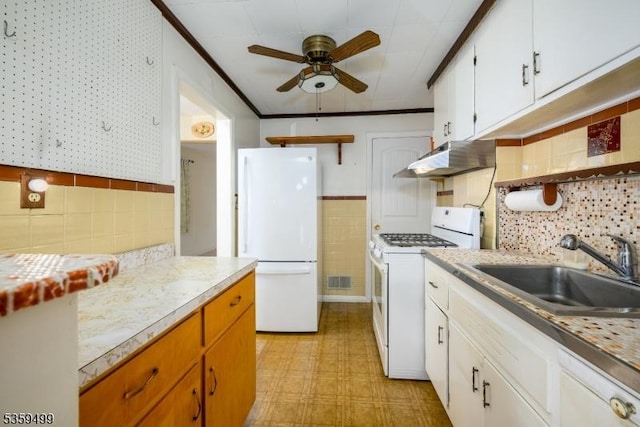 777 W Scott Ave, Rahway City, NJ 07065 - kitchen featuring white appliances, a sink, under cabinet range hood, a ceiling fan, and light floors
