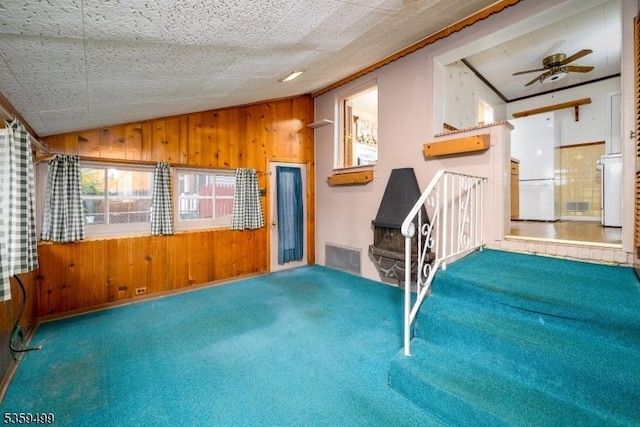 777 W Scott Ave, Rahway City, NJ 07065 - interior space featuring lofted ceiling, wooden walls, and a ceiling fan