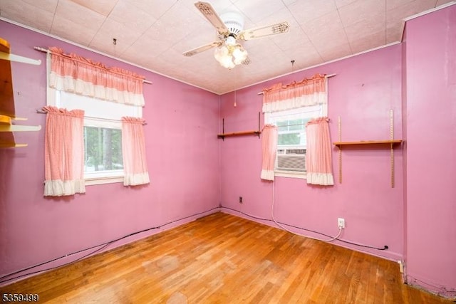 777 W Scott Ave, Rahway City, NJ 07065 - unfurnished room featuring wood finished floors, a ceiling fan, and crown molding
