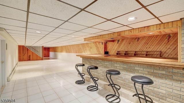 700 Schoolhouse Ln, Bound Brook Boro, NJ 08805 - indoor dry bar featuring wood walls, a baseboard heating unit, a drop ceiling, and recessed lighting