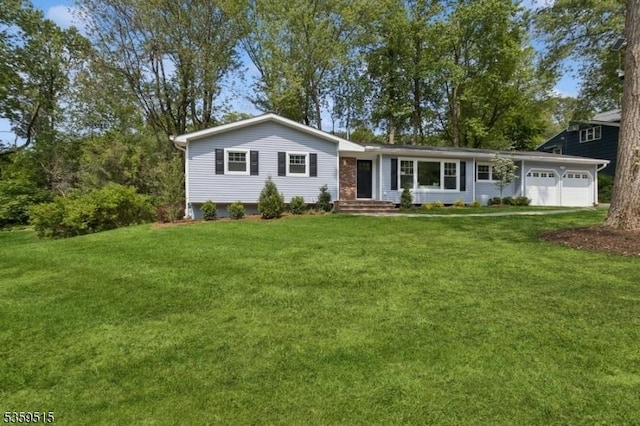 17 Misty Mountain Rd, Randolph Twp, NJ 07869 - view of front facade with a front lawn and an attached garage