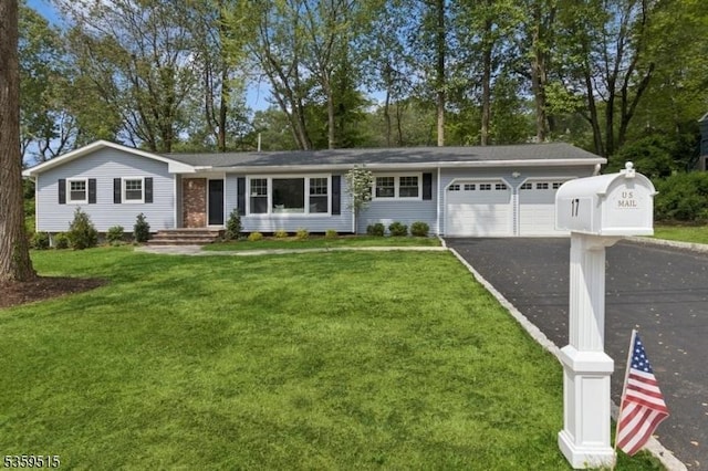17 Misty Mountain Rd, Randolph Twp, NJ 07869 - ranch-style house with a garage, asphalt driveway, and a front yard