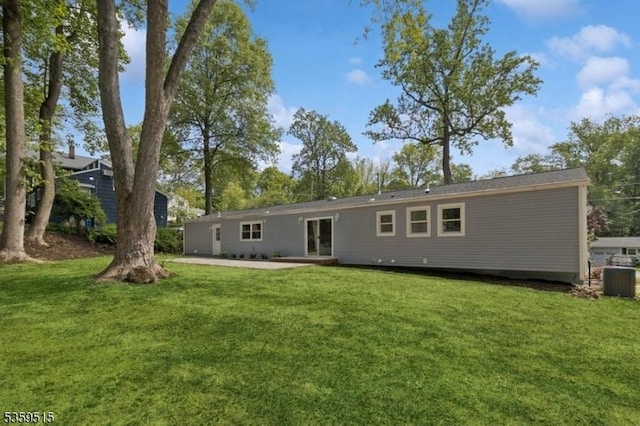 17 Misty Mountain Rd, Randolph Twp, NJ 07869 - rear view of house featuring a yard and a patio area