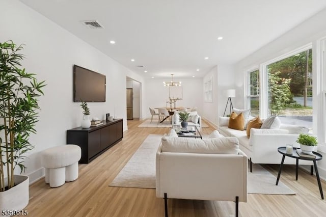 17 Misty Mountain Rd, Randolph Twp, NJ 07869 - living room featuring a chandelier, light wood-style flooring, recessed lighting, and baseboards