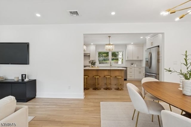 17 Misty Mountain Rd, Randolph Twp, NJ 07869 - living room featuring light wood finished floors, a chandelier, baseboards, and recessed lighting