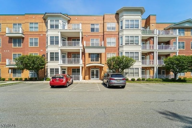 4112 Pointe Gate Dr, Livingston Twp, NJ 07039 - view of apartment building / complex featuring uncovered parking