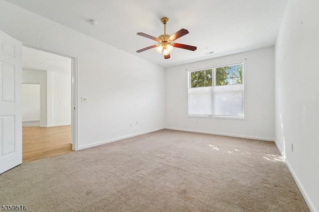 4112 Pointe Gate Dr, Livingston Twp, NJ 07039 - empty room with carpet flooring and ceiling fan