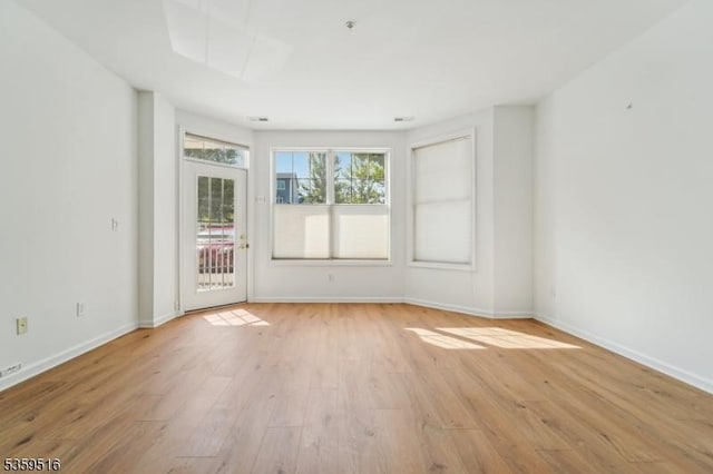 4112 Pointe Gate Dr, Livingston Twp, NJ 07039 - empty room with light wood finished floors and baseboards