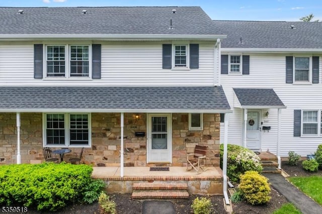 2406 Jamestown Cmn, Hillsborough Twp, NJ 08844 - view of front of home featuring roof with shingles and stone siding