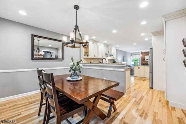 2406 Jamestown Cmn, Hillsborough Twp, NJ 08844 - dining room with a chandelier, light wood finished floors, recessed lighting, and baseboards