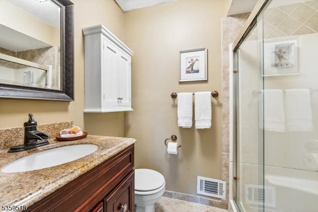 2406 Jamestown Cmn, Hillsborough Twp, NJ 08844 - bathroom with toilet, vanity, a shower stall, and baseboards