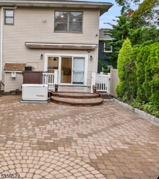 409 Washington St, Carlstadt Boro, NJ 07072 - back of property featuring a patio