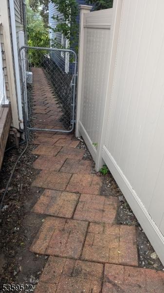 409 Washington St, Carlstadt Boro, NJ 07072 - view of patio featuring a gate