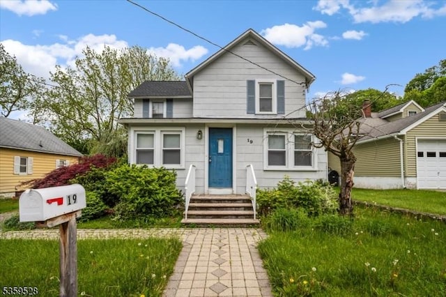 19 Spring St, Ogdensburg Boro, NJ 07439 - view of front facade featuring a garage