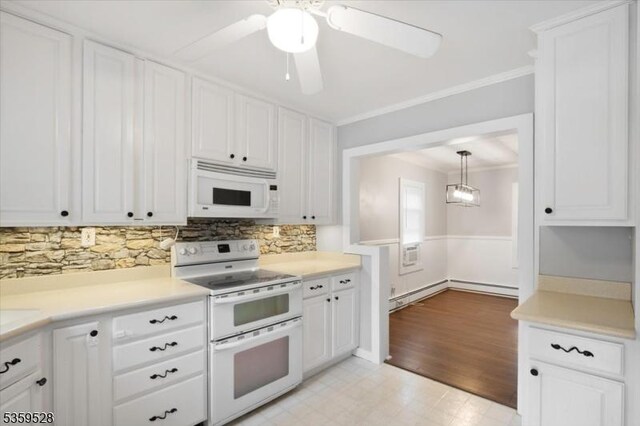 19 Spring St, Ogdensburg Boro, NJ 07439 - kitchen with white appliances, crown molding, ceiling fan, light floors, and white cabinets