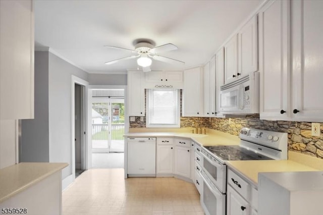 19 Spring St, Ogdensburg Boro, NJ 07439 - kitchen with white appliances, light countertops, backsplash, ceiling fan, and white cabinets